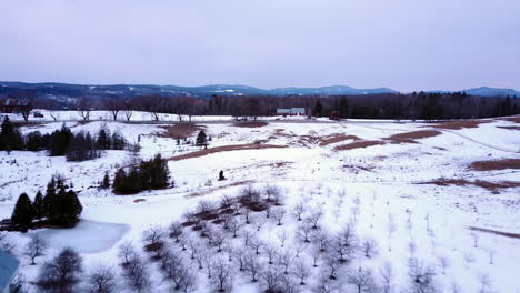 Aerial-footage-taken-by-drone-of-beautiful-winter-landscapes-in-northern-Lyndon,-Vermont