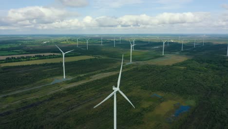 Descending-a-wind-turbine,-aerial-view,-4K,-wind-farm-in-bog-land