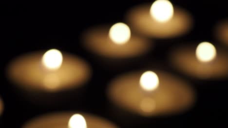 Candles-in-the-dark-out-of-focus-slide-dolly