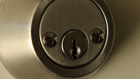Key-Inserted-into-Deadbolt-Door-Lock-and-Turned-to-Right-and-Removed-Residential-Medium-Close