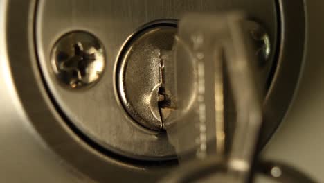 Key-Inserted-into-Deadbolt-Door-Lock-and-Removed-Residential-Close-Up