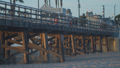 Seal-Beach-pier-with-orange-light-and-shadows