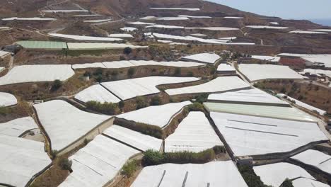 Aerial-view-of-greenhouses-in-different-levels-of-a-mountain-in-the-south-of-Spain