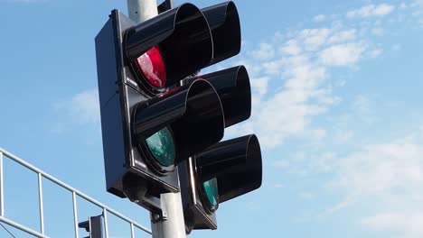 Red-traffic-light-on-background-of-blue-sky