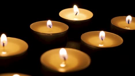 Candles-in-the-dark-dolly-slide-close-up-macro