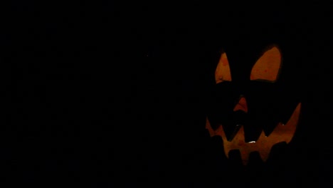 Tall-Jack-O-Lantern-Silhouette-With-Strobe-Pumpkin-Light-Halloween-Framed-Right-Angled