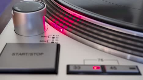 Close-up,-Modern-Turntable-With-Rotating-Vinyl-Record,-DJ-Gear,-Equipment