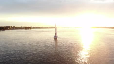 Aerial-tracking-shot-of-a-traditional-sailing-boat-on-the-upper-Columbia-river