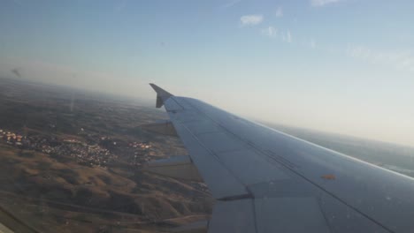 View-of-the-wing-of-a-plane-while-descending