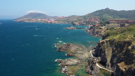 Aerial-shot-near-the-historical-town-and-port-of-Collioure-and-the-French-Spanish-border-at-the-Mediterranean-Sea