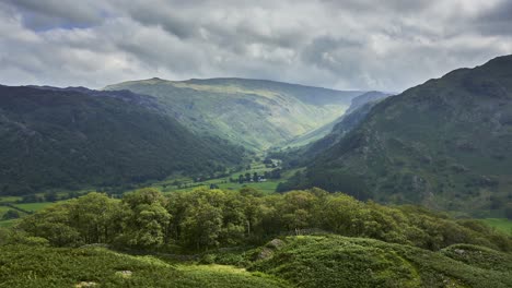 Slow-panning-time-lapse-in-the-English-Lake-District-showing-Stonethwaite-valley-and-the-ridges-of-nearby-fells-with-moving-sun-beams-and-clouds