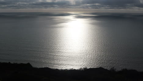 Reflection-of-sun-along-south-coast-of-the-UK,-Devon