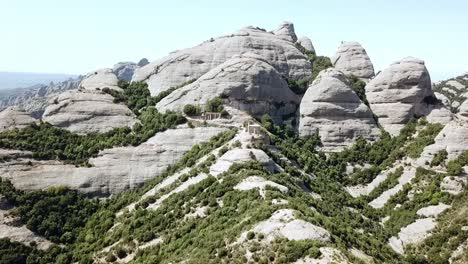 Aerial-view-of-the-Montserrat-mountains-near-Barcelona,-Catalonia,-Spain,-Europe