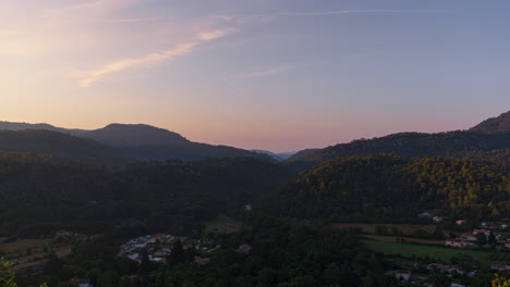 Time-lapse-of-the-sunrise-over-the-valley-in-between-the-mountains-in-the-Cote-d'Azur-region-of-France