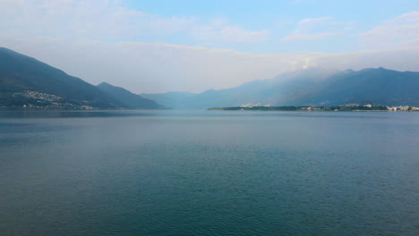 Wide-aerial-shot-above-the-Lake-Maggiore,-Switzerland