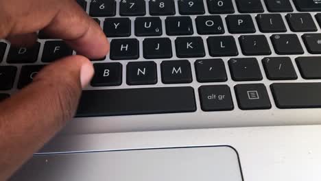 Hands-typing-keyboard-of-Laptop