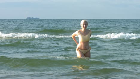 A-young-woman-with-white-hair-enjoying-the-vacation-in-the-ocean