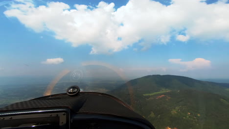 Cockpit-view-of-aircraft-flying-below-clouds,-pilots-view-from-an-airplane,-light-sport-airplane,-freedom-above-the-clouds