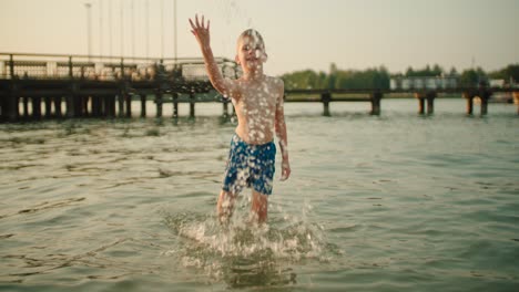 Slow-Mo:-Little-kid-Splashing-Water-At-Camera
