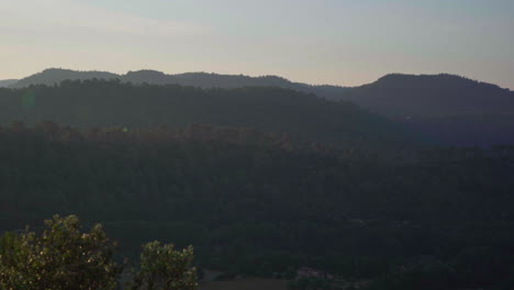 A-slow-pan-in-the-morning-over-a-valley-located-in-the-Cote-d'Azur-region-in-France