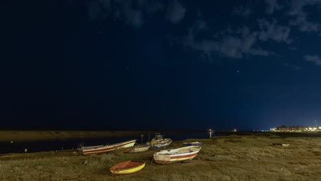 Night-Stars-Timelapse-with-boats-in-land
