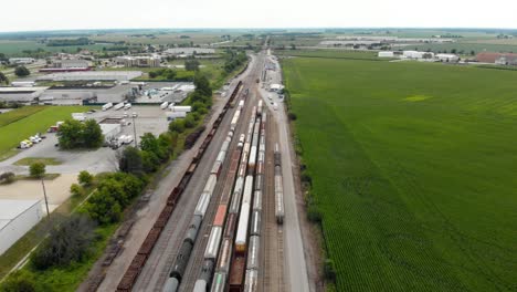 4k-aerial-view-of-multiple-trains-waiting-to-leave-a-train-station