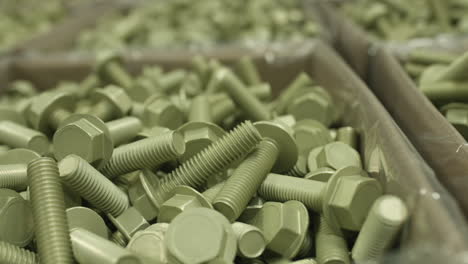 Sliding-shot-of-boxes-full-of-powder-coated-bolts-ready-for-shipment-from-the-warehouse