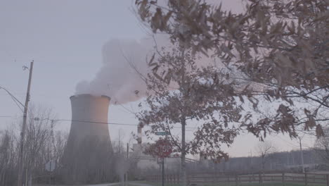 smoke-stack,-factory-and-fall-trees-in-slo-mo