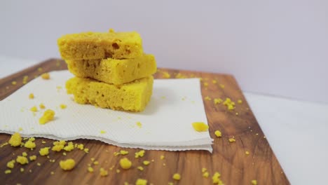 Closeup-shot-of-Mysore-pak-or-Mysuru-paaka,-is-an-Indian-sweet-prepared-with-ghee-it-is-Famous-in-Southern-India