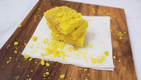 Closeup-shot-of-Mysore-pak-or-Mysuru-paaka,-is-an-Indian-sweet-prepared-with-ghee-it-is-Famous-in-Southern-India