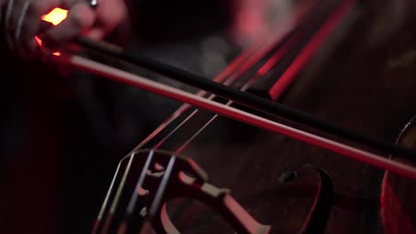 Playing-the-cello-in-dark-room