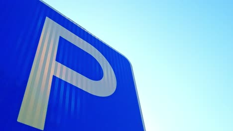 Parking-road-sign-close-up-with-blue-sky