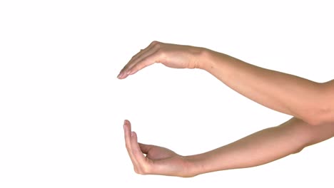 Two-hands-facing-each-other-as-a-symbol-of-protection-and-insurance