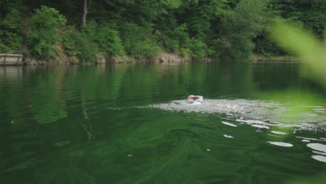 man-in-Lake-swimming-training-for-triathlon