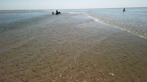 Waves-on-a-sandbank-in-the-northern-sea,-Zeeland,-Netherlands---4k60