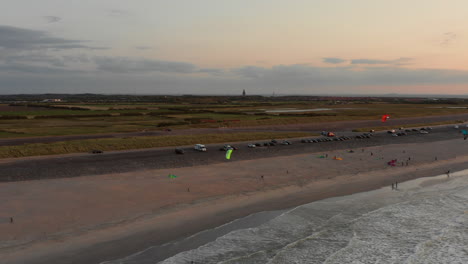 Kitesurfers-near-the-beach-of-Domburg-during-sunset