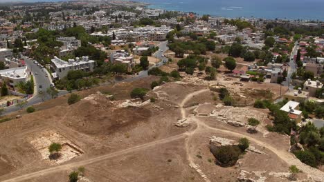 Aerial-shots-of-ruins-at-a-historical-site-of-Paphos,-Cyprus