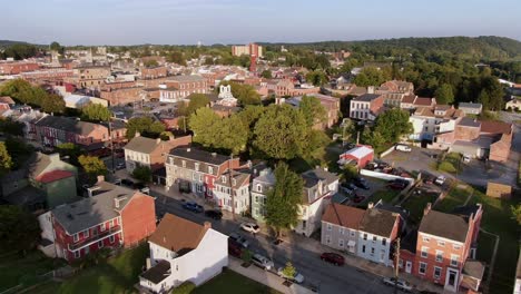 Aerial-of-historic-American-homes-in-small-town-America-at-sunset,-Columbia,-Lancaster,-Pennsylvania