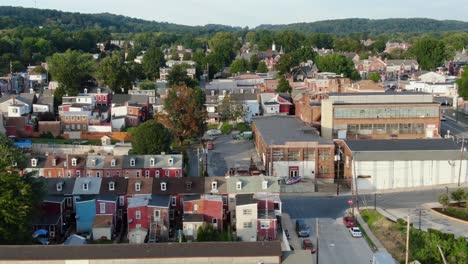 Aerial-shot-of-run-down-blighted-buildings-and-homes,-poverty-and-crime-in-urban-neighborhood-community