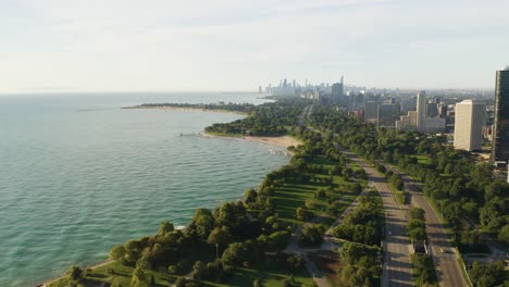 Dolly-Left---Aerial-shot-of-Chicago-skyline-from-northern-neighborhoods-[4k