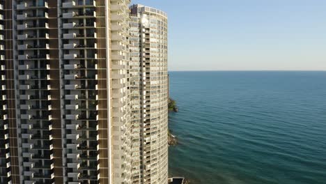 Aerial-shot-of-High-Rise-Condominiums-along-the-Water-[4k