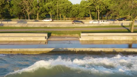 Static-aerial-shot-of-waves-crashing-along-Chicago's-Lakeshore-Path-due-to-high-water-levels