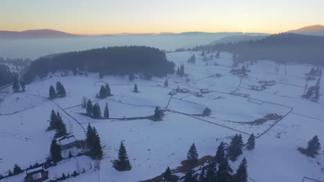 Aerial-view-of-the-tourist-sport,-Ski-area-and-recreational-resort-on-the-mountain-Jahorina-at-sunset,-Bosnia-and-Herzegovina
