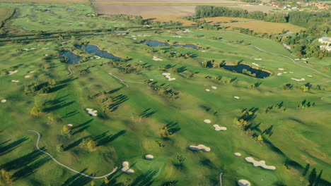 Aerial-birds-eye-footage-of-a-golf-course-in-Bac,-near-Bratislava-in-Slovakia