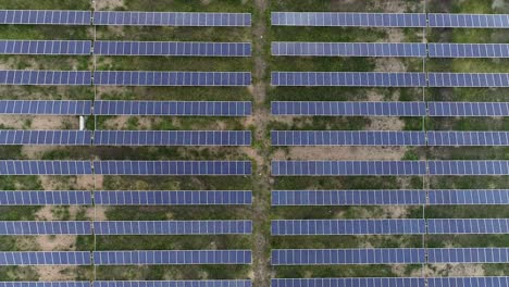 Aerial-View,-Flying-over-the-wast-Solar-Power-Plant-or-solar-power-system-at-India