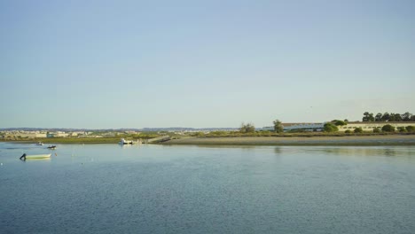 River-in-the-morning-with-ride-boats-at-Tavira-Portugal