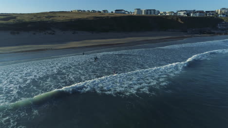 Arial-shot-of-surfers-in-Cornwall