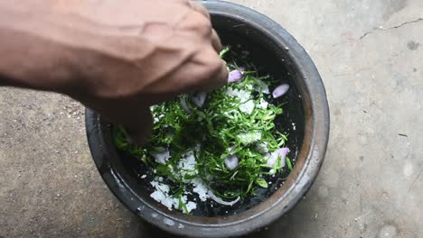 Edible-leaves-called-Dregea-volubilis-making-as-food-in-clay-pot-in-Sri-Lanka
