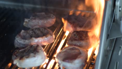 A-filet-mignon-grilled-while-bacon-burning-fat