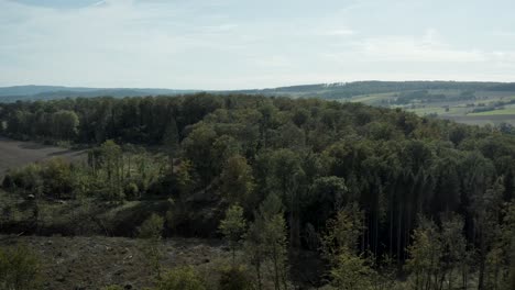 Aerial-drone-shot-over-beautiful-german-landscape,-woods,-Europe